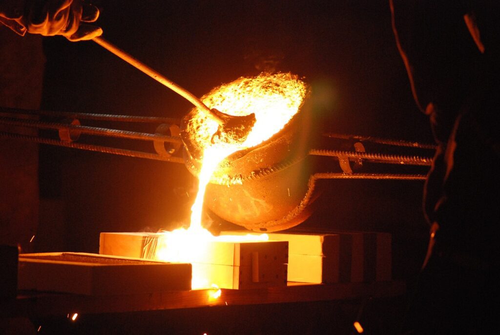 molten metal being poured into a furnace